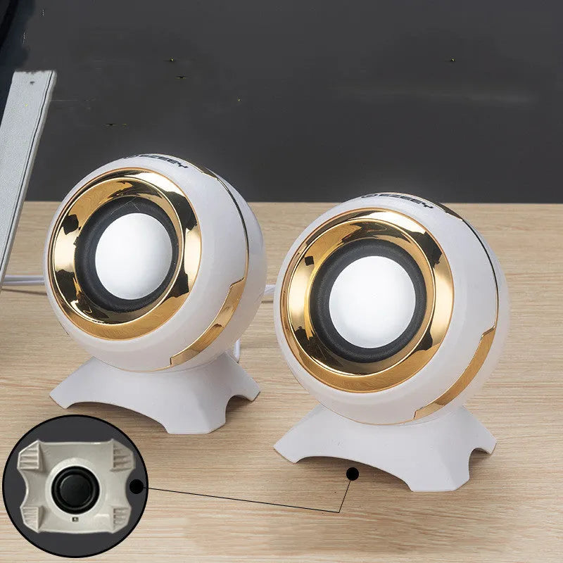 Pair of compact desktop speakers with USB cable and 3.5mm audio connection