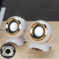 Pair of compact desktop speakers with USB cable and 3.5mm audio connection