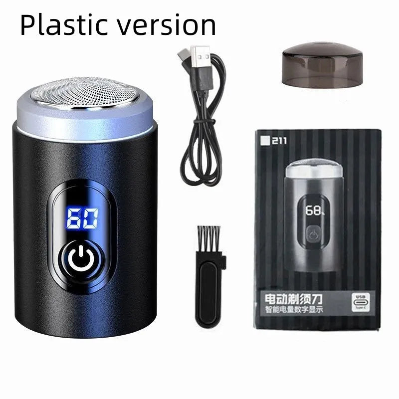Black USB rechargeable mini shaver with cleaning brush and cable on a white background.