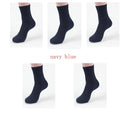 A pair of men's bamboo fibre socks in a classic colour, showing the small square pattern and medium thickness.