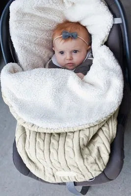 Envelope baby stroller sleeping bag in a plain colour with thick filling for winter.
