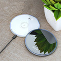 Black or white 15W fast wireless Qi charger with LED light indicator and anti-slip surface
