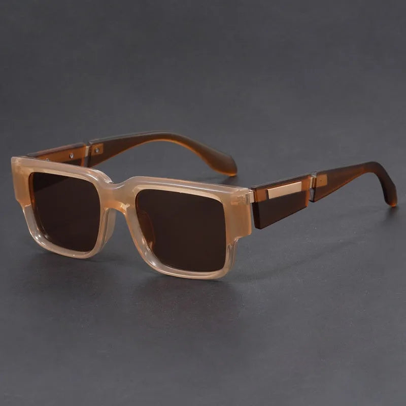 Blue frame retro square sunglasses with grey blue lenses and thick arms.