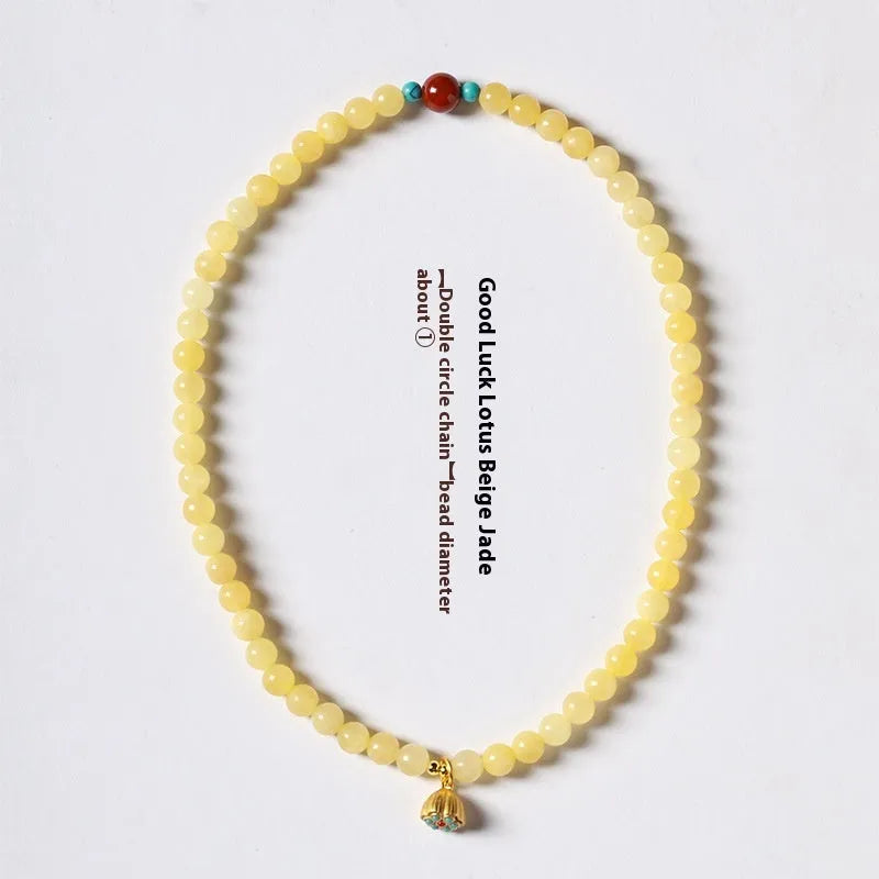 Yellow jade double ring bracelet with lotus seedpod design in hand-woven construction