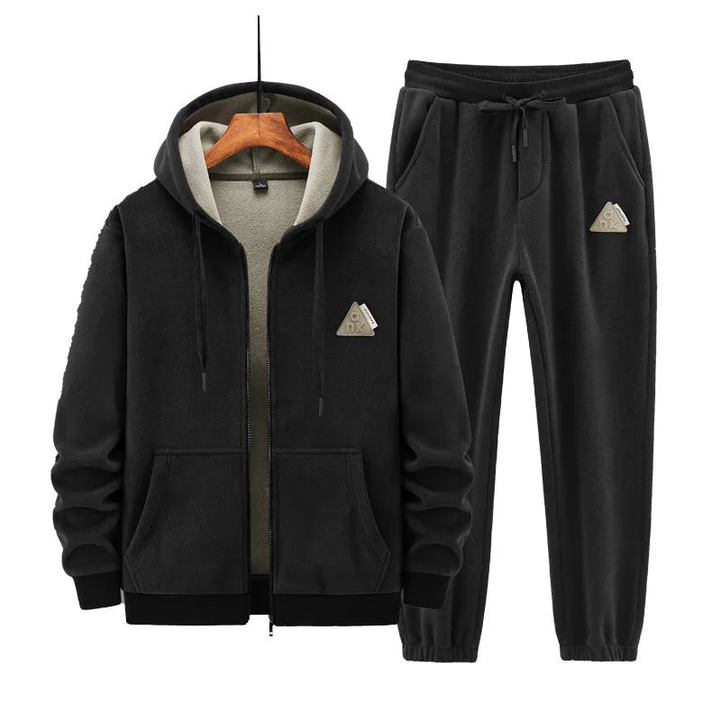 Grey cashmere hooded sweater and matching pants casual sports suit laid flat.