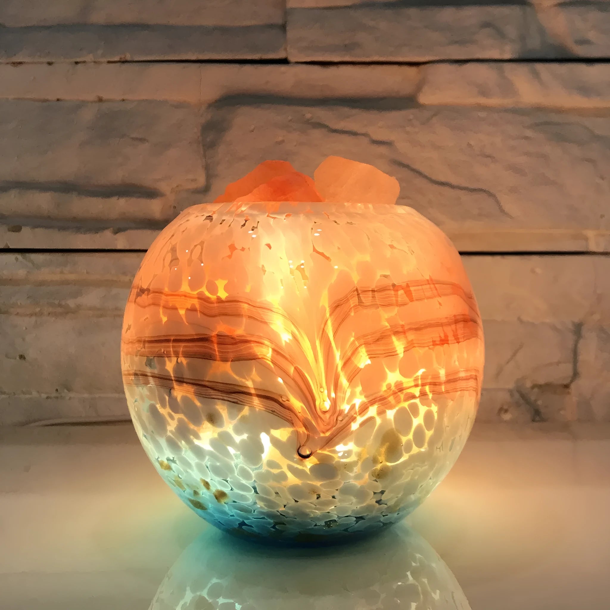 Hand-blown lead-free glass night light with USB cable, 13cm height, on a bedside table