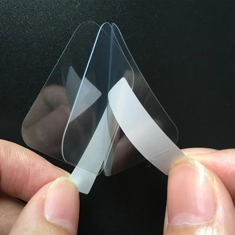 Three transparent PET screen protectors for Ticwatch2 smartwatch on packaging.