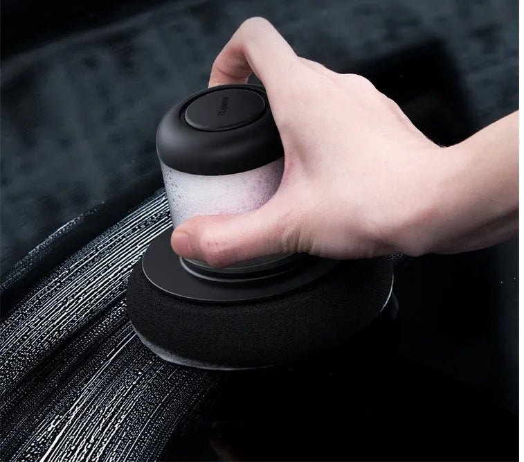 Dual-action car polishing machine with 6 speed settings in black ABS PC body with sponge pad attached
