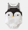 Newborn baby wearing a white sleeveless cotton vest with a colourful star print design.