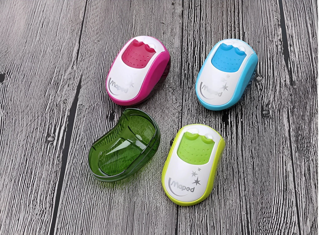 A single hole manual pencil sharpener with a double aperture design for different pencil thicknesses.