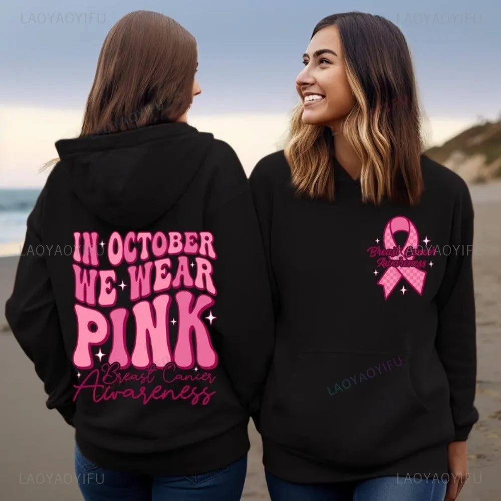 Breast Cancer Awareness pullover hoodie with retro print and side seam pockets in pink.