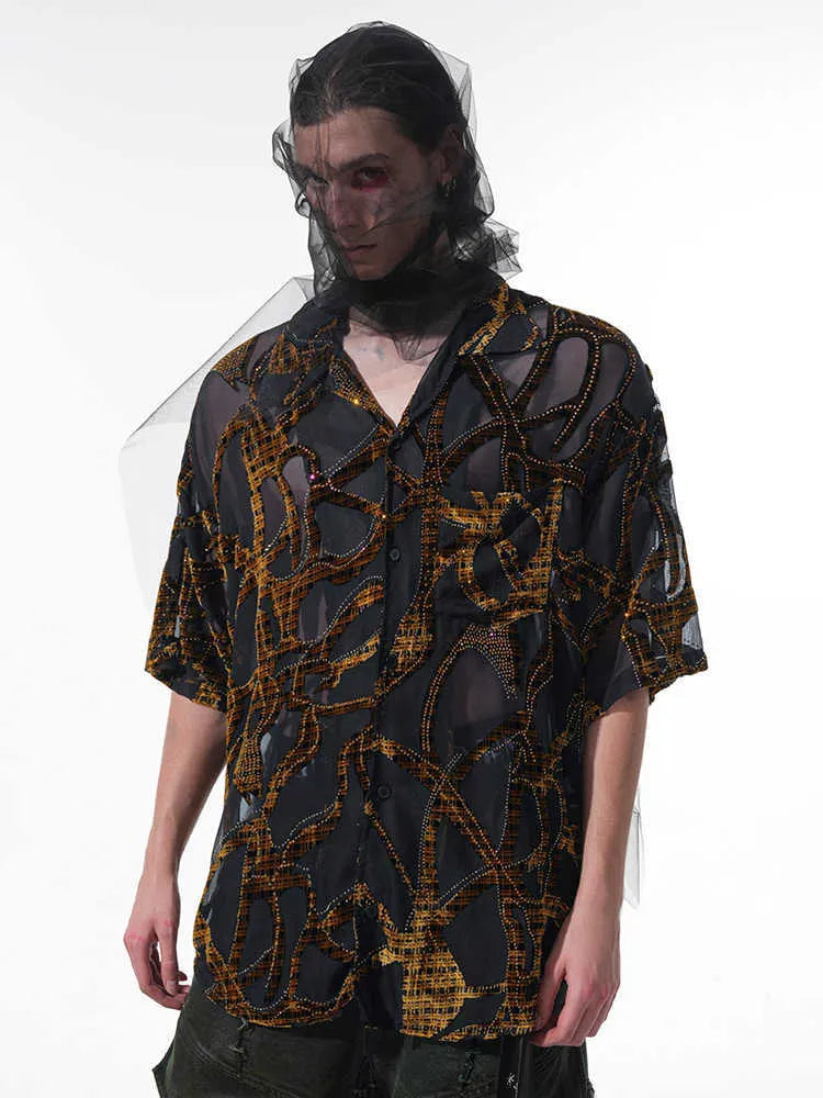 Man's loose fit short-sleeved shirt with translucent black grey snake pattern and lapel collar