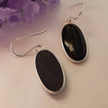 Women's geometric earrings with oval black agate pendant on 925 sterling silver with electroplated finish