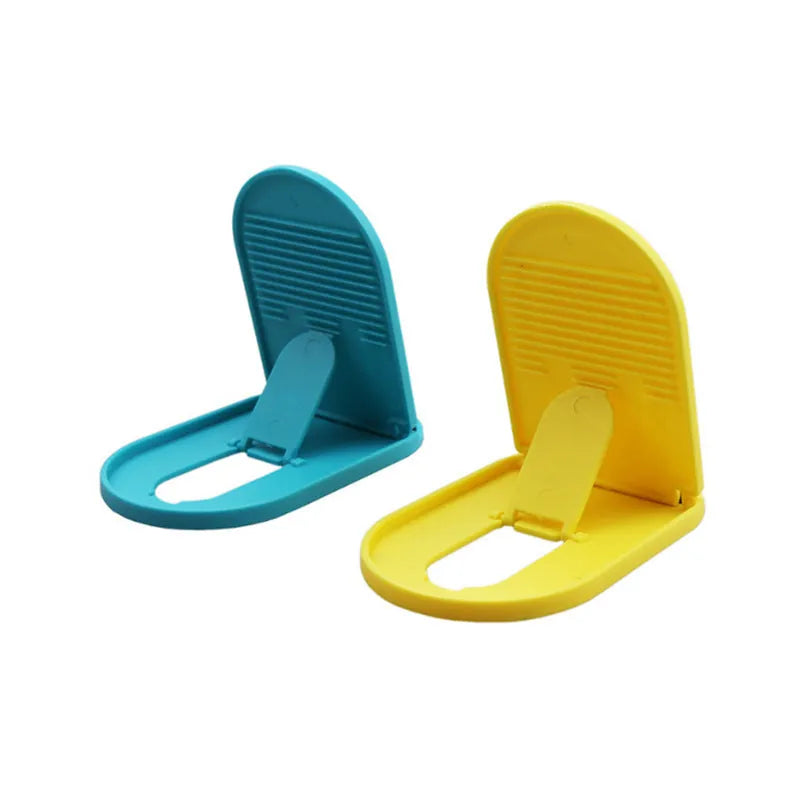Adjustable plastic lazy bracket mobile phone stand in six colour options on desk