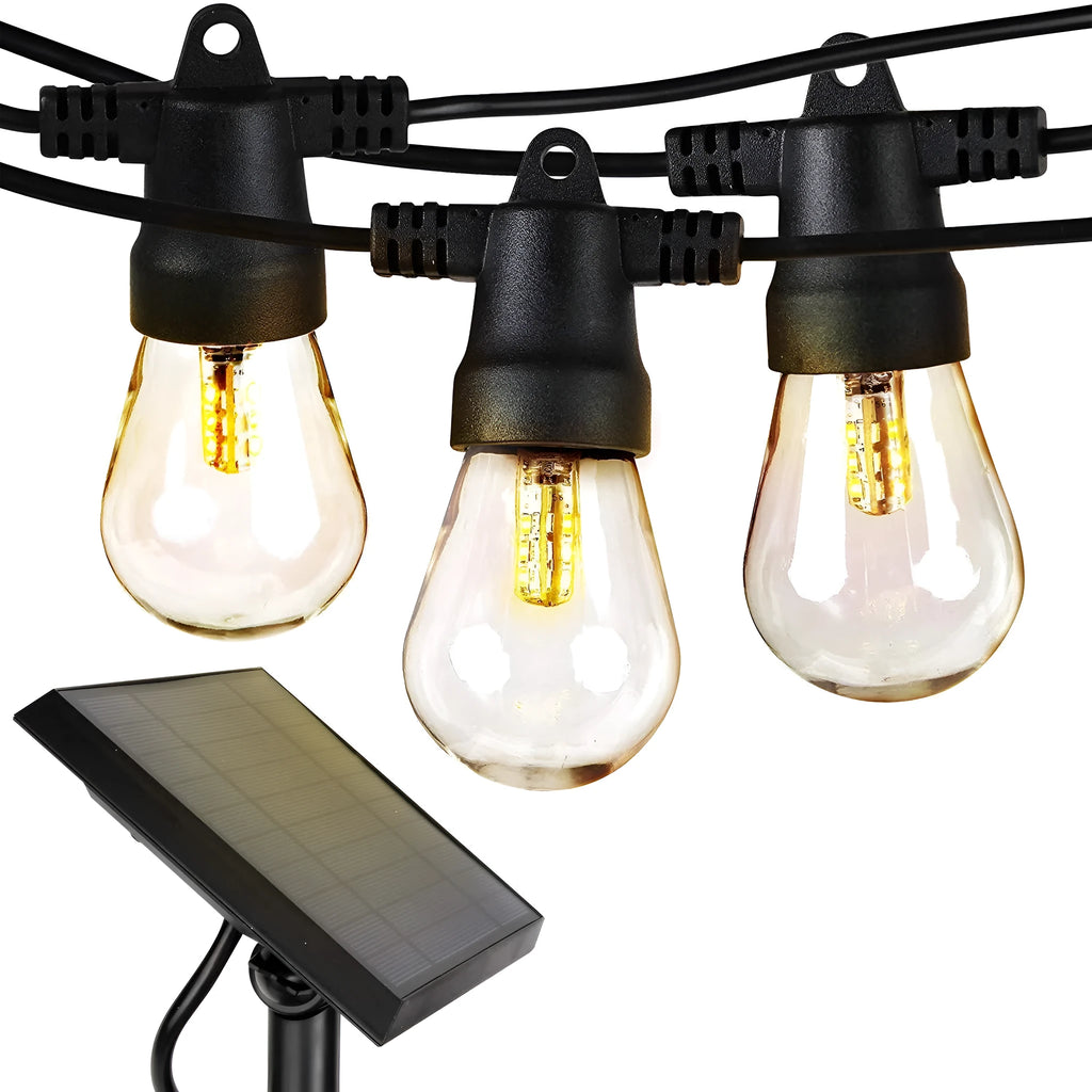 Waterproof solar-powered LED string lights hanging outdoors on a garden fence.