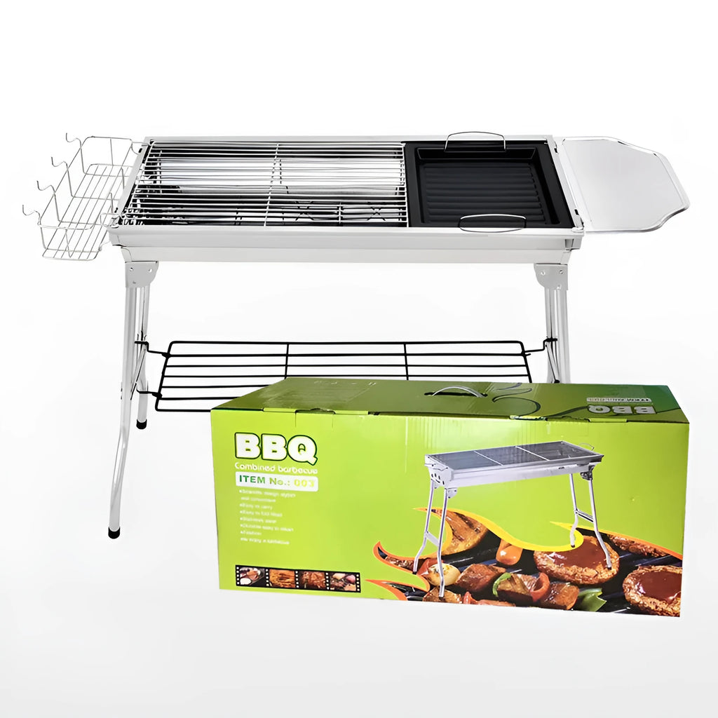 Stainless steel folding portable barbecue grill set up outdoors.