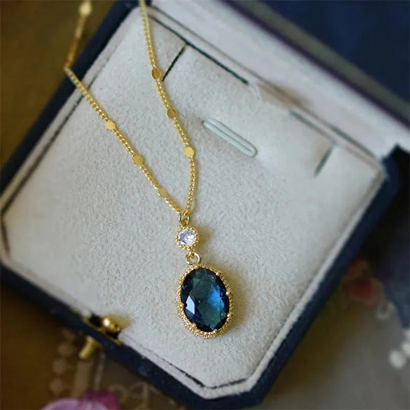 Geometric French retro style copper necklace with a gold electroplated finish.