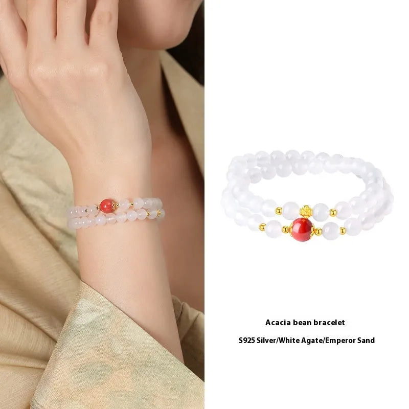 White double layer agate bracelet with 6mm geometry-shaped beads on a wrist