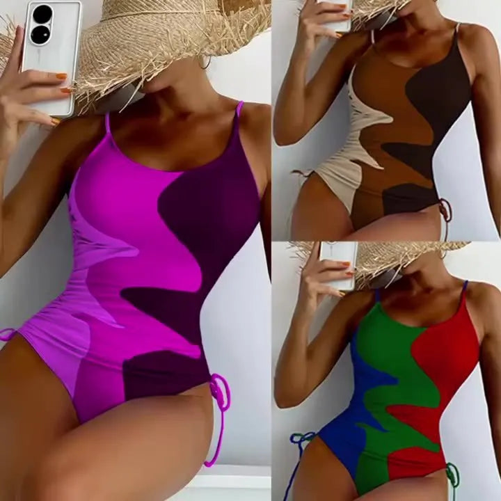 Women's sleeveless one-piece swimsuit in printed design with multiple colour options