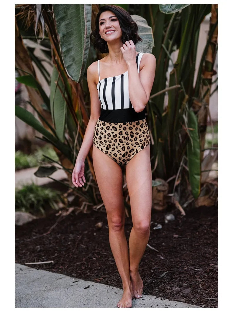 Leopard print one-piece swimsuit for women with an asymmetric collar and high-waist triangle briefs.