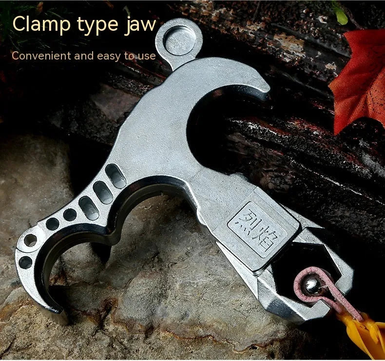 Zinc alloy archery release aid with a two-axis harpoon clip and stainless steel spring mechanism.