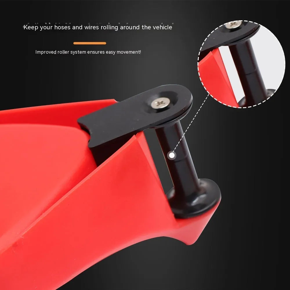 Four bright red triangular plastic parking blocks for car tyres