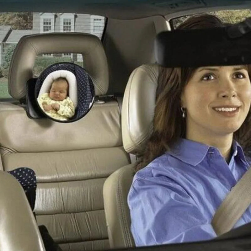 Black baby car rearview mirror with adjustable strap for viewing children in reverse-facing seats