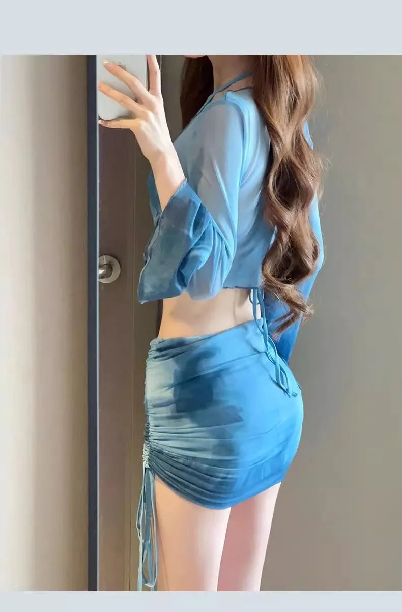 Women's blue high-waist bikini four-piece swimsuit set with shirt, bra, underwear and skirt