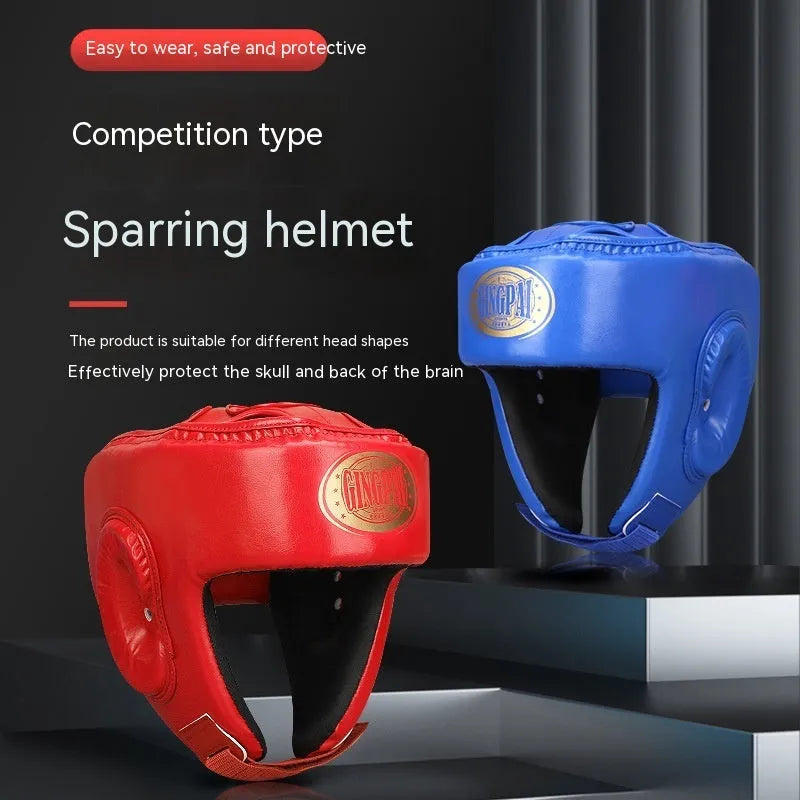 Red fully enclosed boxing helmet with jaw protection on white background