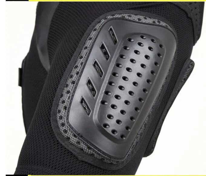 Black cycling hip protection pants with integrated pad, shown laid flat.