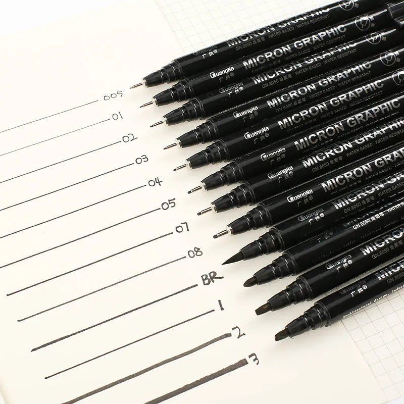 Set of 12 black comic hand-painted pens with various nib sizes in a storage bag organiser