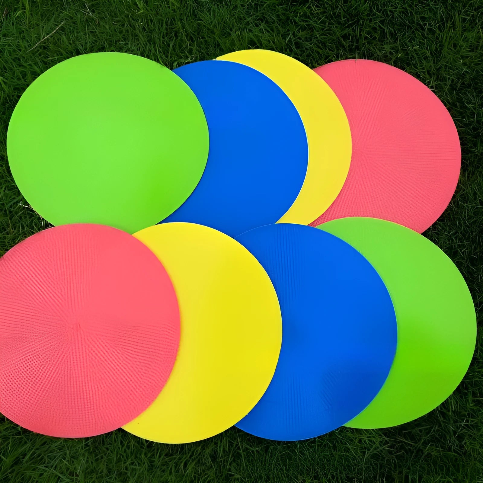 Yellow TPE football landmark pad disc on grass, 23cm diameter flat sports training marker.