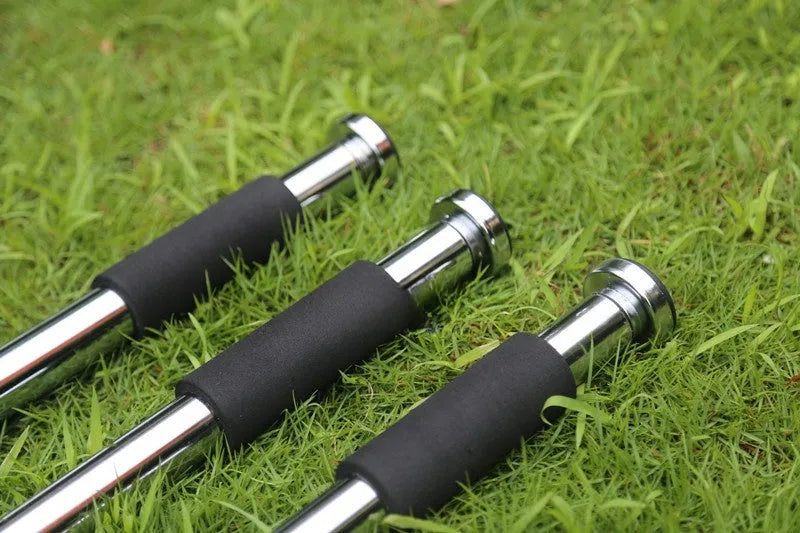 Steel adjustable indoor pull-up bar extended for door frame fitness training.