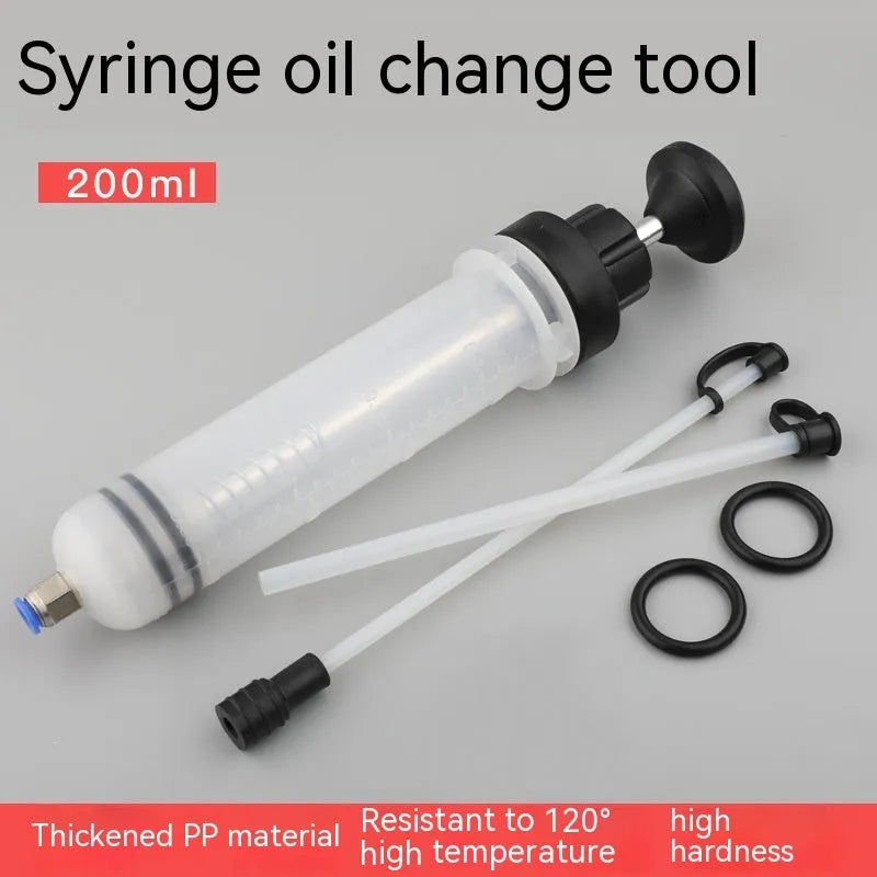 Manual oil pump tool with syringe-style barrel for suction and injection fluid transfer