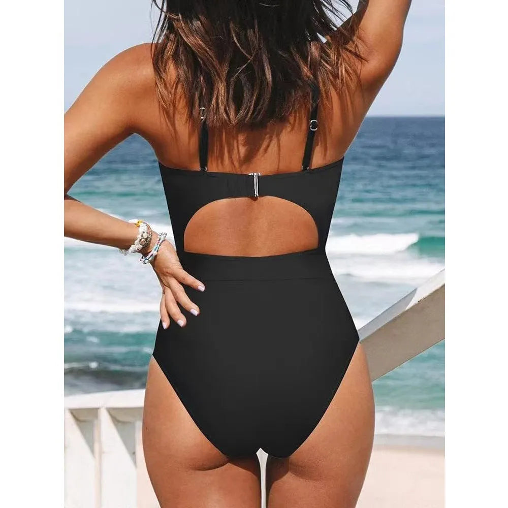 Backless one-piece swimsuit for women in solid colour on a mannequin.