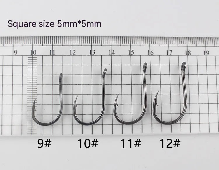 Bulk pack of alloy carbon steel barbed fishing hooks in various sizes for sea and rock fishing.