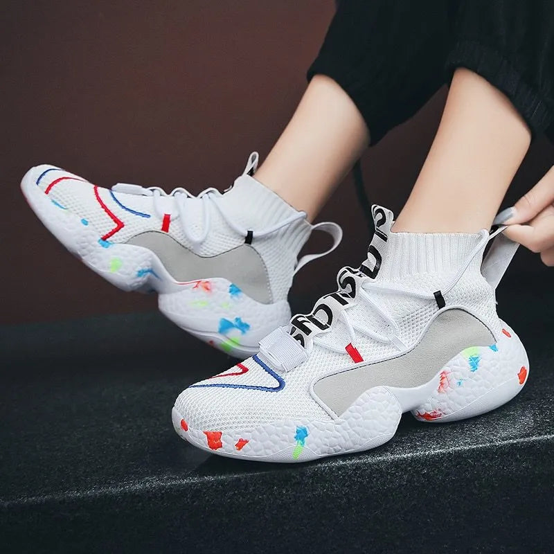 Men's camouflage pattern sneakers with mesh upper and vulcanised rubber flat sole.