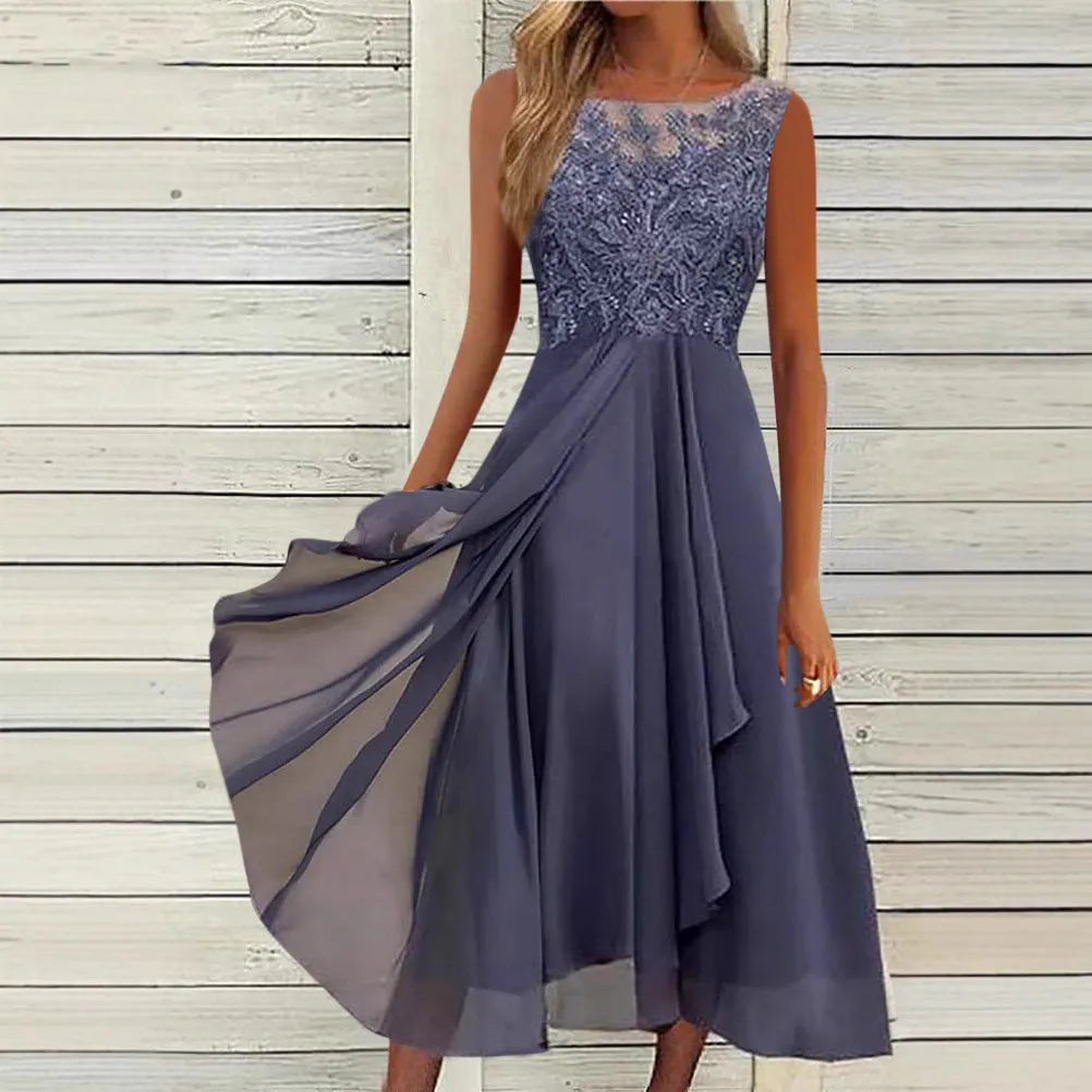 Women's sleeveless green chiffon dress with lace stitching and a mid-length skirt.