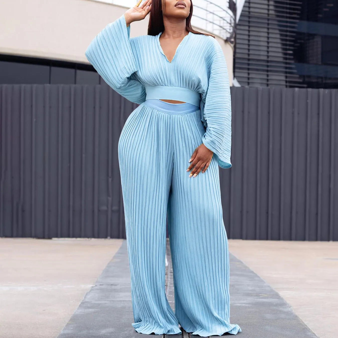 Women's African two-piece suit set with batwing sleeves and wide leg trousers in red or sapphire blue