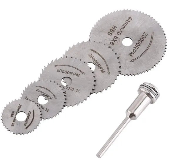 Six high-speed steel circular saw blades and a mandrel arranged on a surface, showing size variation.