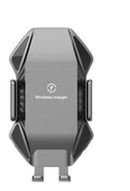 Black wireless car charger with auto-sensing clamp mounted on a car dashboard.