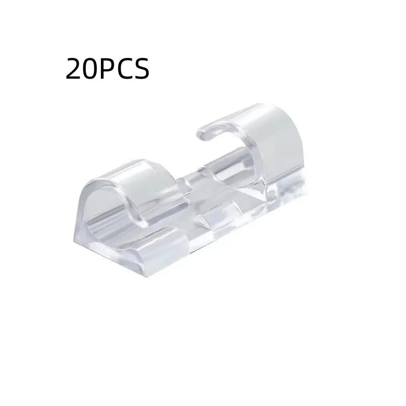 Transparent plastic self-adhesive cable clips for wire organisation in four sizes