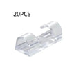Transparent plastic self-adhesive cable clips for wire organisation in four sizes