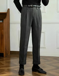 Grey straight-leg casual trousers with a high waist on a hanger.