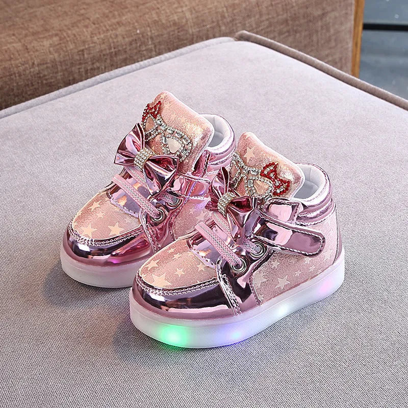 LED children's trainers with magic button switch showing colour changing lights and flashing heel illumination
