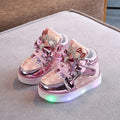 LED children's trainers with magic button switch showing colour changing lights and flashing heel illumination