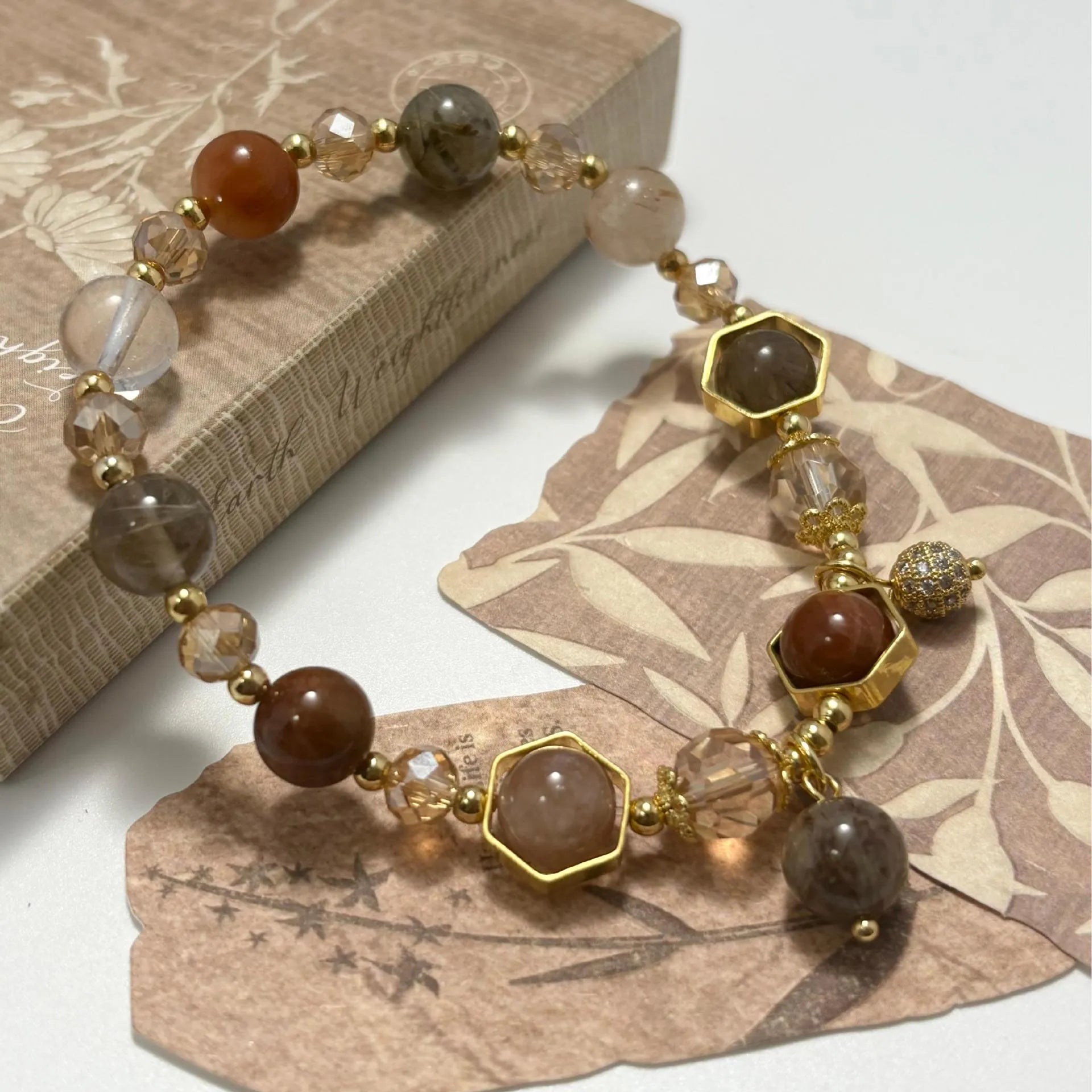 Gold luxury bracelet with 8mm crystal beads featuring constellation modelling and auspicious symbol ornaments