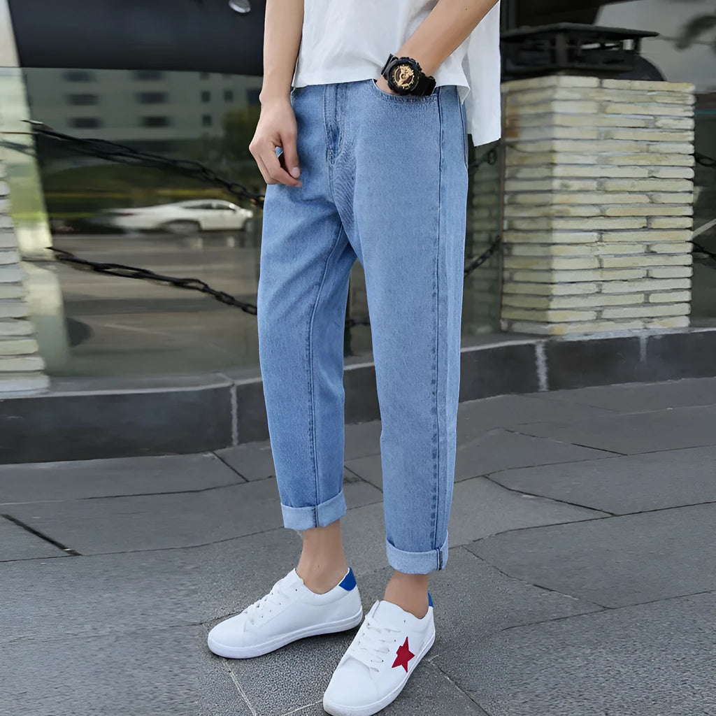 Men's loose fit straight leg cotton jeans in black or blue for casual spring autumn wear
