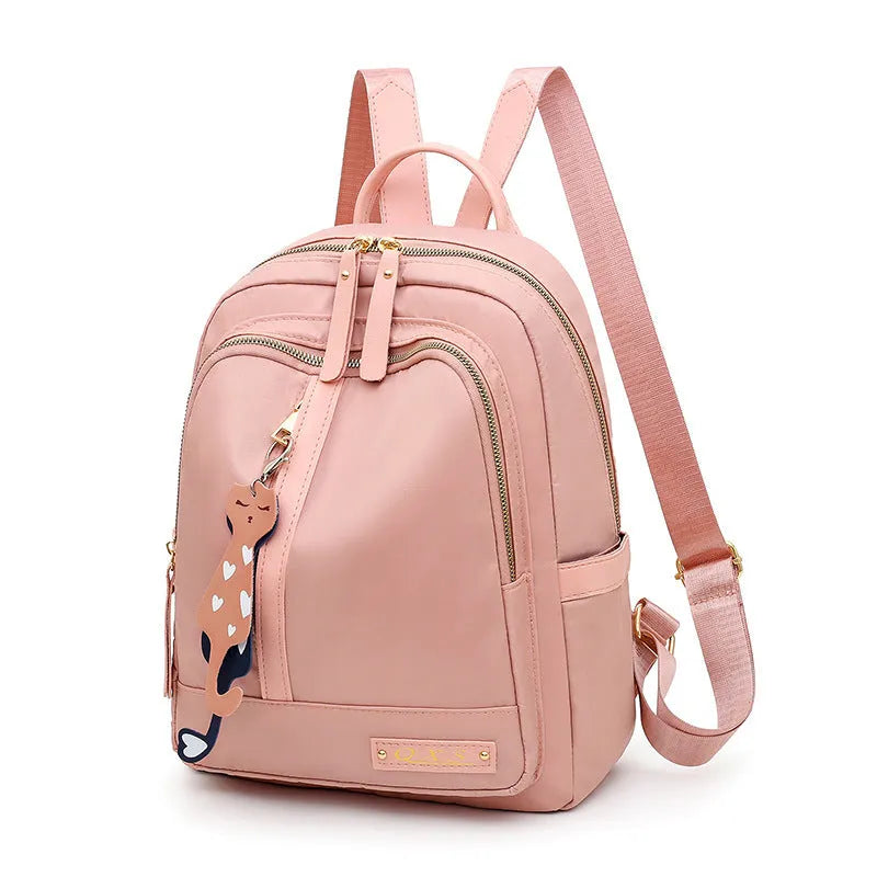 Men's black casual nylon backpack with shoulder straps, showing outer pocket and square vertical shape.