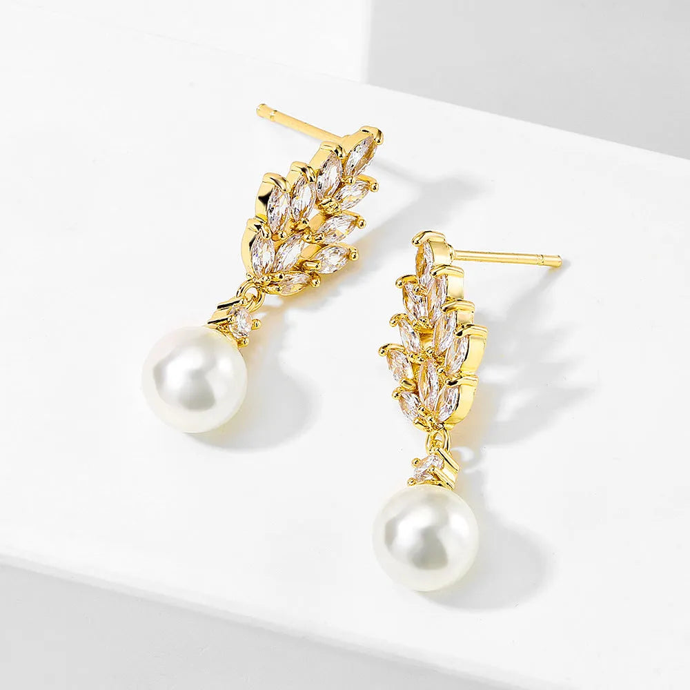 Geometric flower earrings with micro inlaid zircon stones in gold, platinum, or rose gold plating.